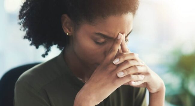 Burnout, stress and business woman in office with problem, mistake and working on deadline. Headache, anxiety and African female worker with frustrated, stressed out and migraine thinking of solution different types of stress
