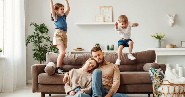 Tired parents spending day at home with kids managing stress for parents
