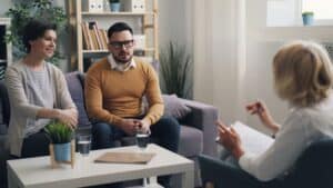 therapist facilitating productive conversation between partners